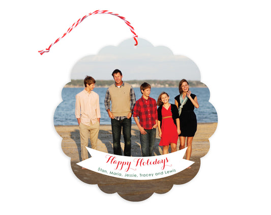 Front of customizable paper holiday ornament card featuring a photo, “Happy Holidays” greeting and personal message. Round ornament with scalloped edges.