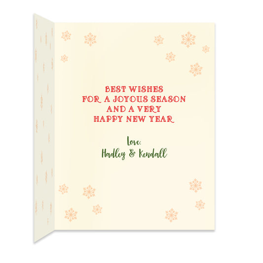 Inside of folded holiday card with coordinating snowflake design and personal greeting.