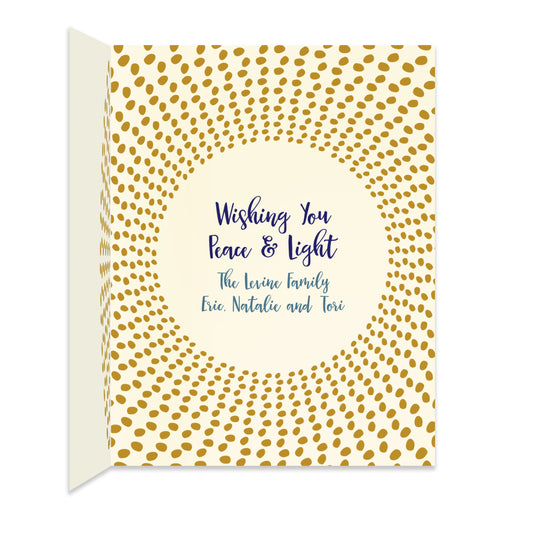 Inside of folded Hanukkah card with coordinating radiant gold dot design and a personal greeting.