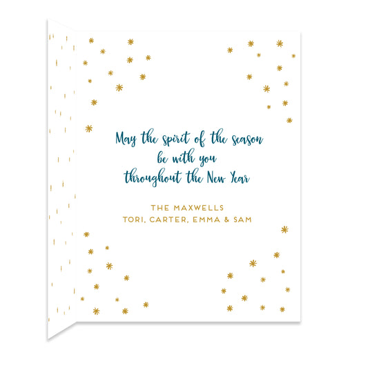Inside of folded paper holiday card with coordinating gold star design and a personal greeting.