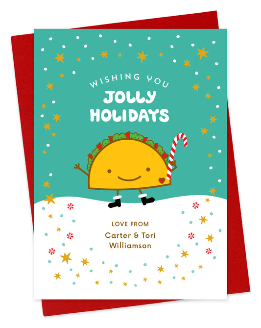 Customizable paper holiday card featuring a happy taco in front of a festive winter backdrop, a "Wishing You Jolly Holidays" sentiment and a personal greeting. Shown with a red envelope.