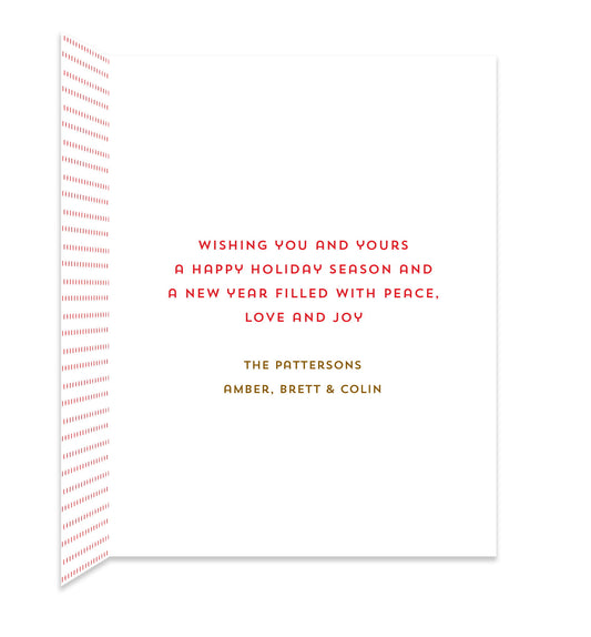Inside of folded holiday card with coordinating small red dots and a personal greeting.