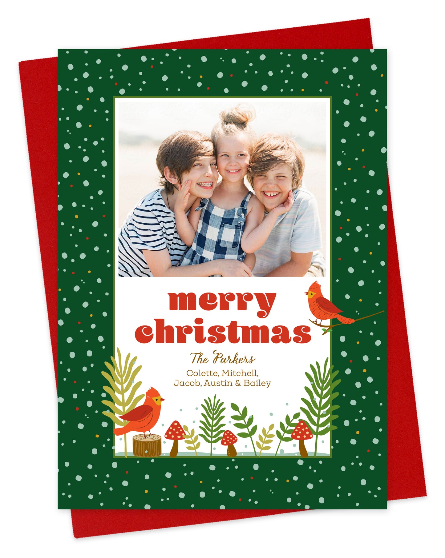 Personalized holiday card with cardinals and mushrooms on green background, printed on white paper.
