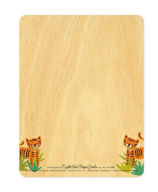Back of Wild Tigers wood love card, which features small tigers in the corners and space to handwrite a personal greeting. Along the bottom is the company logo and text that reads "eco-friendly sustainably harvested wood - made in the usa - birmingham, owlabama - nightowlpapergoods.com"