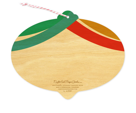 Back of Merry Bulb wood holiday ornament card, which is die-cut in the shape of a bulb and features swag design elements on top and space to write a personal greeting. Along the bottom is the company logo and text that reads "eco-friendly sustainably harvested wood - made in birmingham, owlabama - nightowlpapergoods.com"