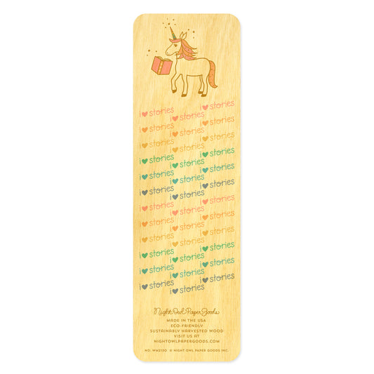 Back side of wooden bookmark with unicorn illustration and 'i heart stories' text