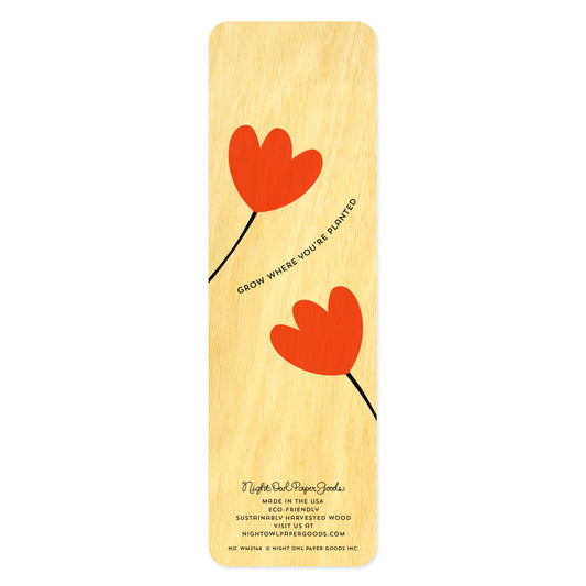 Back side of wooden bookmark with red tulip design text reads 'Grow where you're planted'