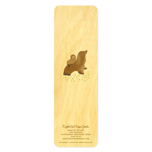Back side of wooden bookmark with two illustrated sea lions
