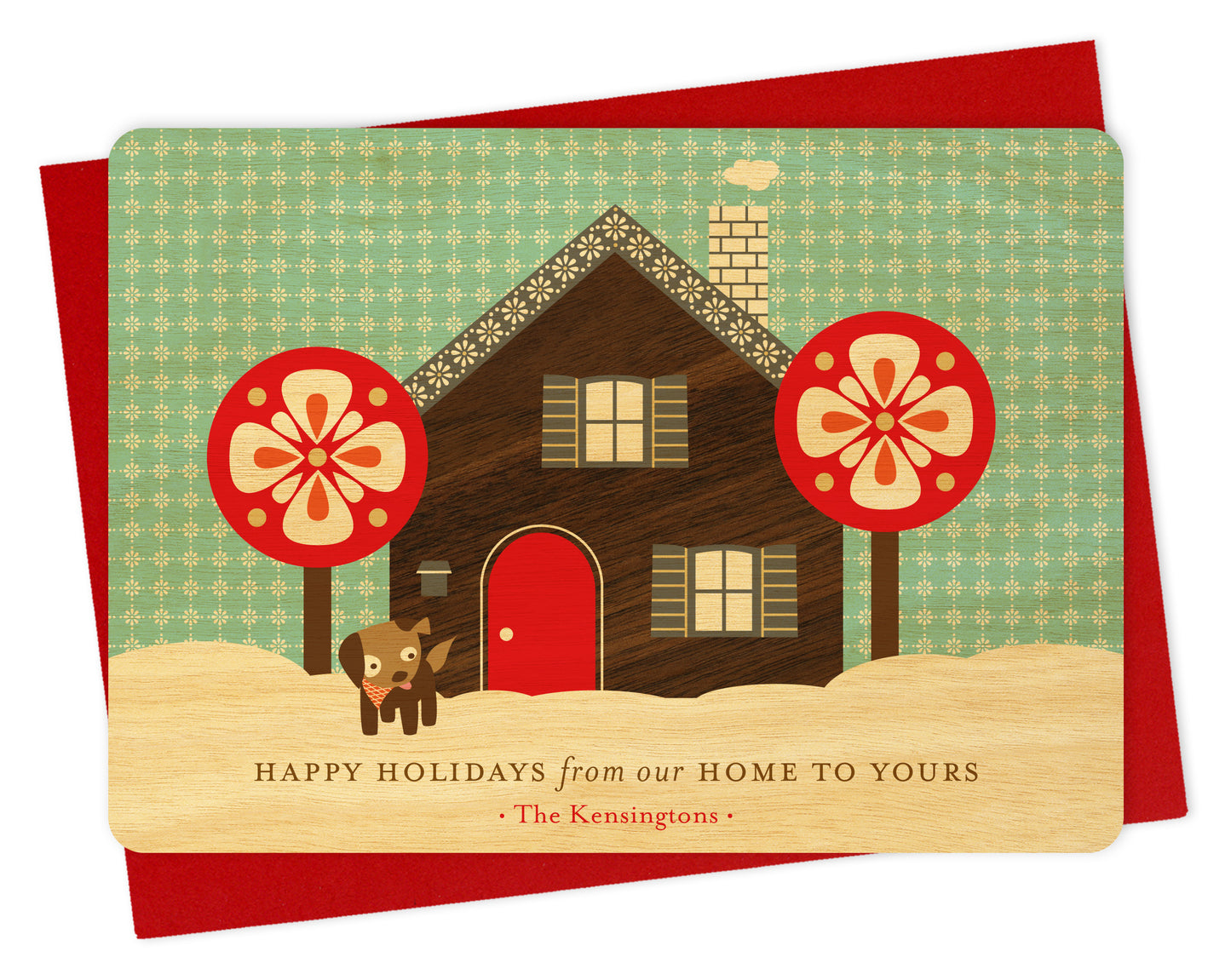 Customizable birch wood holiday card with a printed walnut wood grain house, dog, snowy sky, "Happy Holidays from our Home to Yours" text and a personal greeting. Shown with a red envelope.