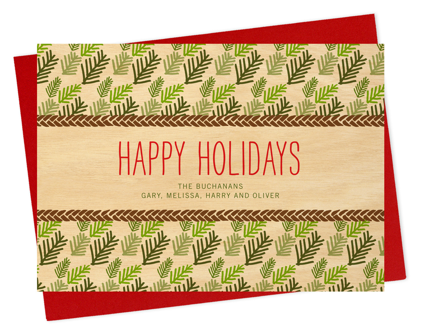 Front of personalized paper holiday card with evergreen leaf pattern, "Happy Holidays" text and a personal greeting on a printed birch wood background. Shown with a red envelope.