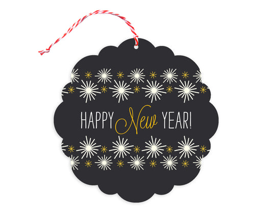 Front of customizable paper holiday ornament card with "Happy New Year!" text on a black background with gold and white stars. Round ornament with scalloped edges.