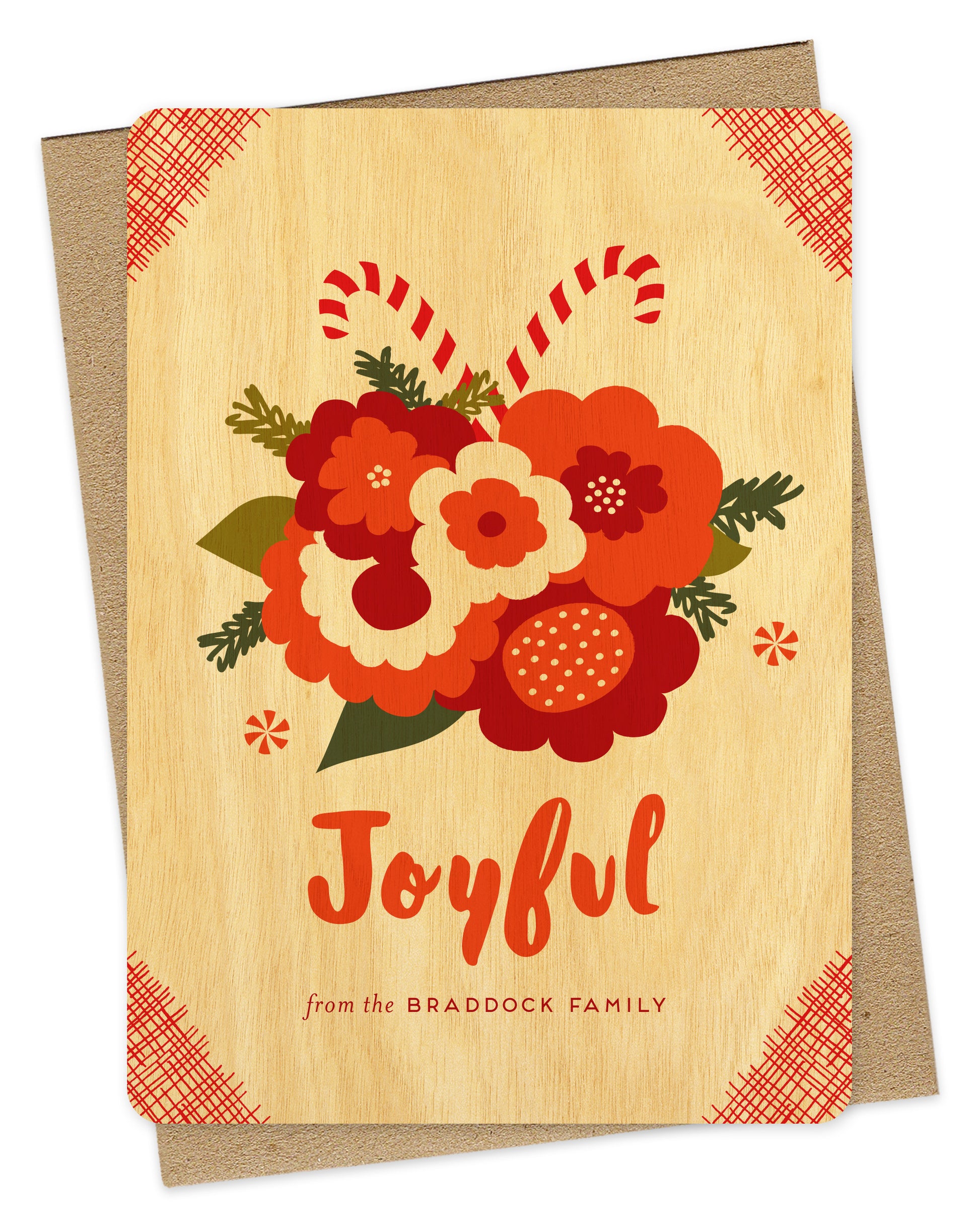 Customizable birch wood holiday card with a festive bouquet of flowers and candy canes, “Joyful” text and a personal message on a white background. Shown with a kraft envelope.