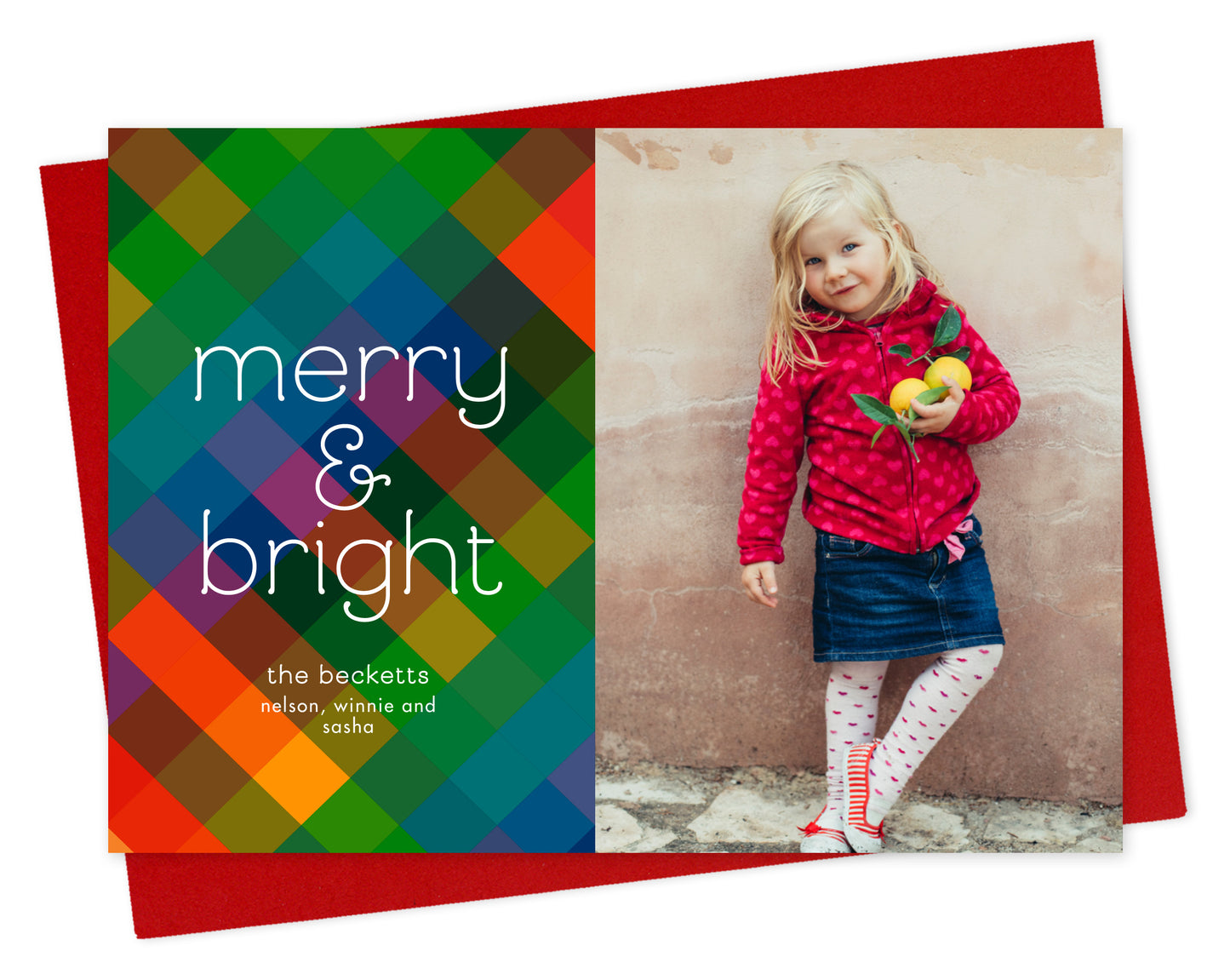 Customizable paper holiday card featuring a photo on the right and a colorful patchwork pattern with “merry & bright” text and a personal greeting on the left. Shown with a red envelope.
