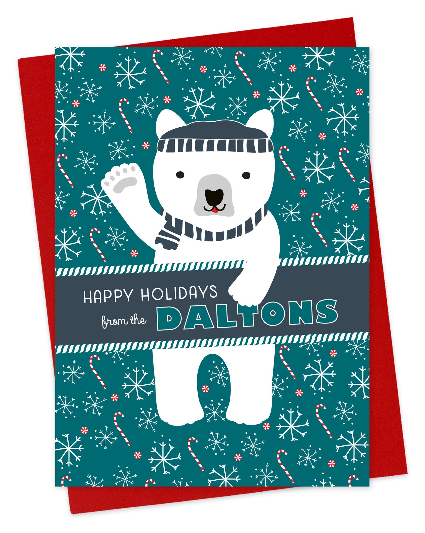 Customizable paper holiday card featuring a waving polar bear in a beanie and scarf against an aqua background with candy canes and snowflakes. A banner across the middle displays a personal greeting. Shown with a red envelope.