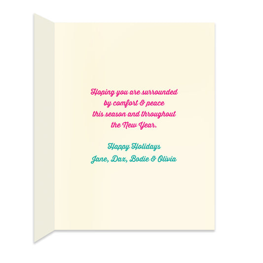 Inside of folded holiday card with personal greeting in coordinating pink and blue colors.