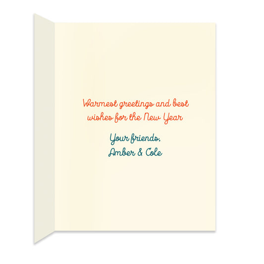 Inside of folded holiday card with personal greeting in colors and font that coordinate with the design on the front of the card.