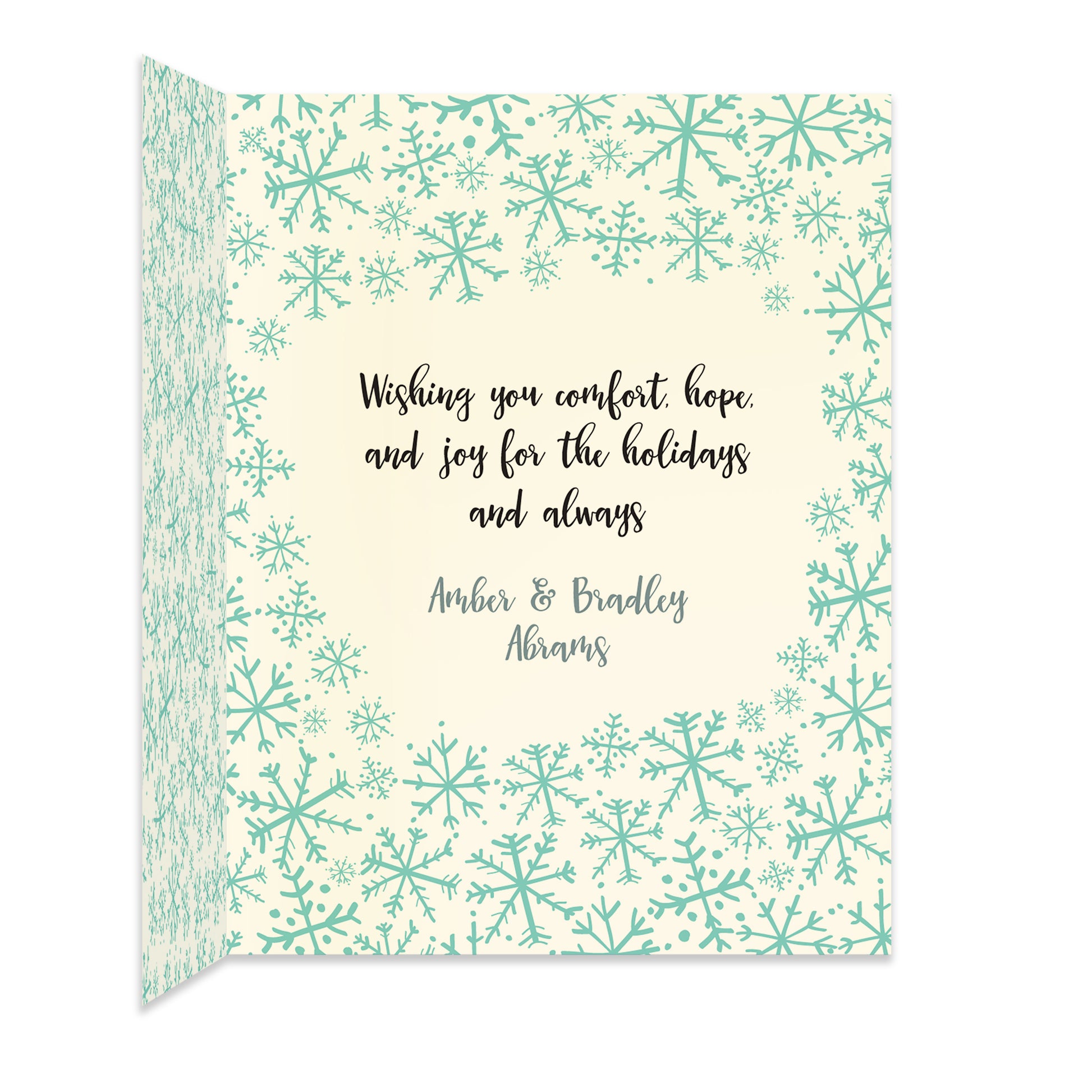 Inside of folded holiday card with coordinating snowflake pattern and personal greeting.