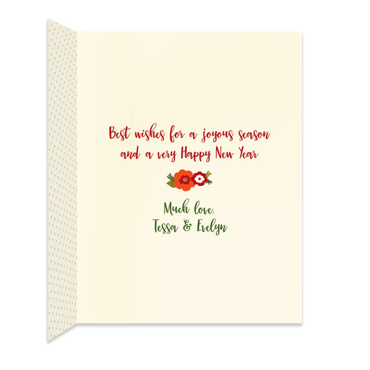Inside of folded holiday card with a a coordinating floral design and a personal greeting.