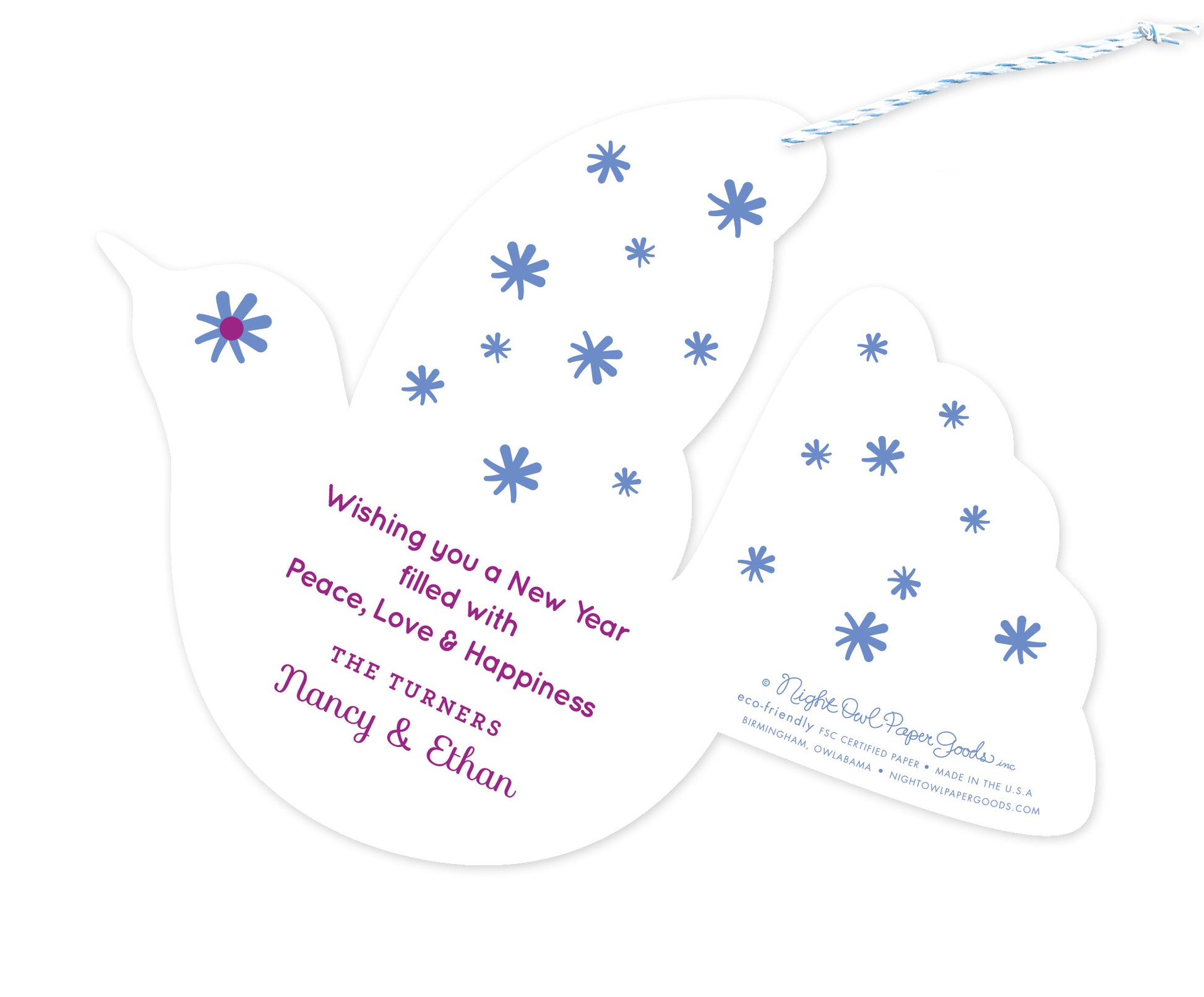 Back of personalized dove-shaped paper holiday ornament card with a personal greeting and a star pattern on a white background.