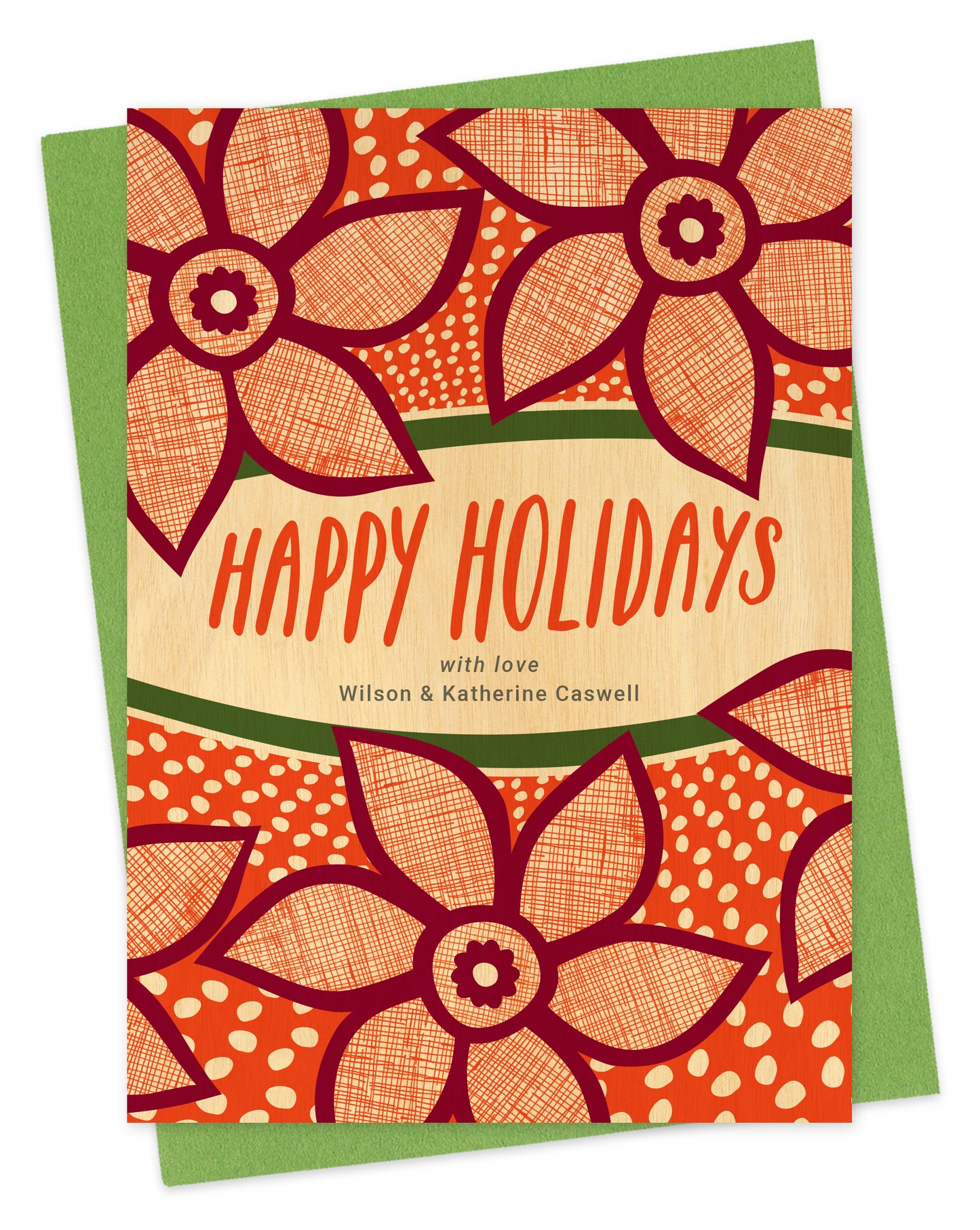 Customizable paper holiday card with red poinsettias, “Happy Holidays” text and a personal message on a printed birch wood background. Shown with a green envelope.