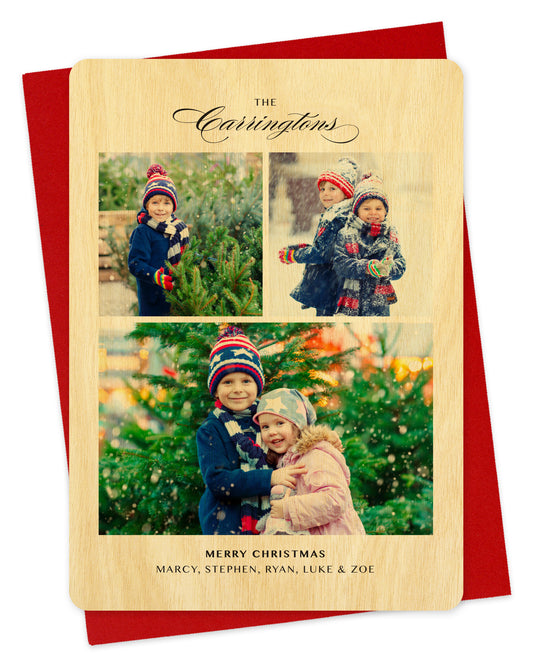Customizable wood holiday card showcasing 3 photos with a script family name at the top and personal greeting at the bottom, framed by birch wood. Pictured with a red envelope. 