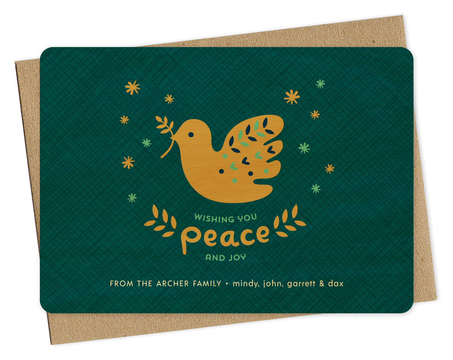 Customizable wood holiday card featuring a dove carrying an olive branch, “Wishing You Peace and Joy” text and a personal greeting on a blue crosshatch patterned background. Shown with a kraft envelope.