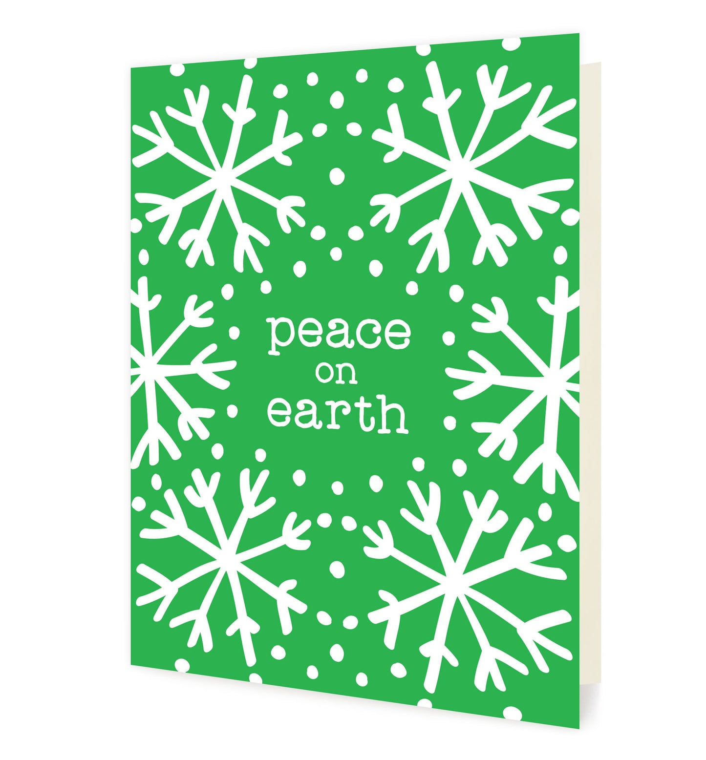 Front of folded holiday card featuring bright white snowflakes on a vibrant green background with “Peace on Earth” text.