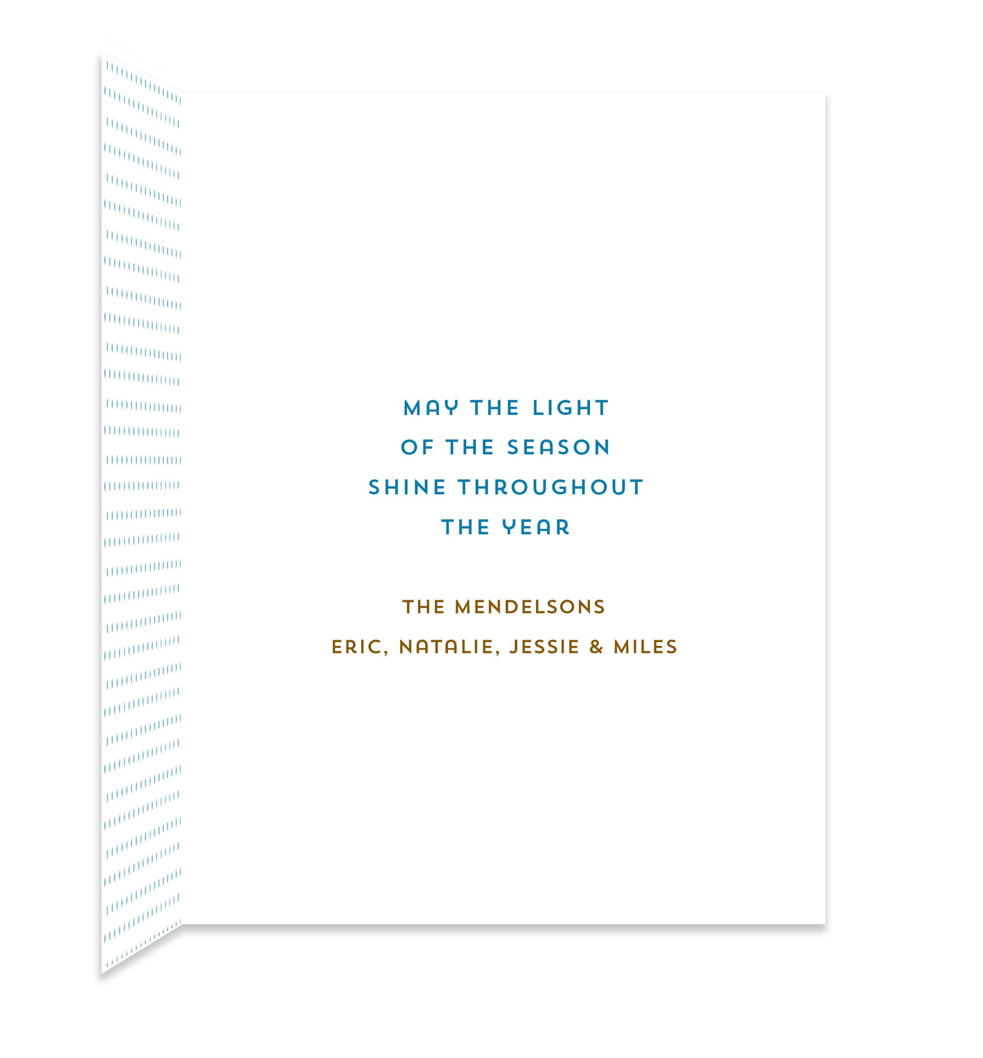 Inside of folded holiday card with coordinating small blue dots and a personal greeting.