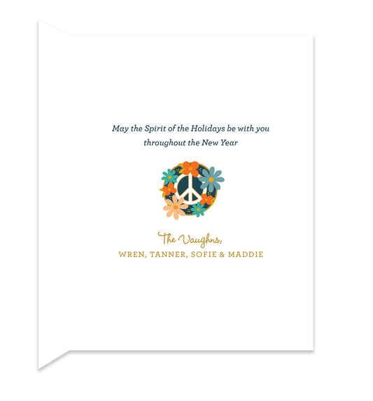 Inside of folded holiday card with coordinating floral peace sign and personal message.