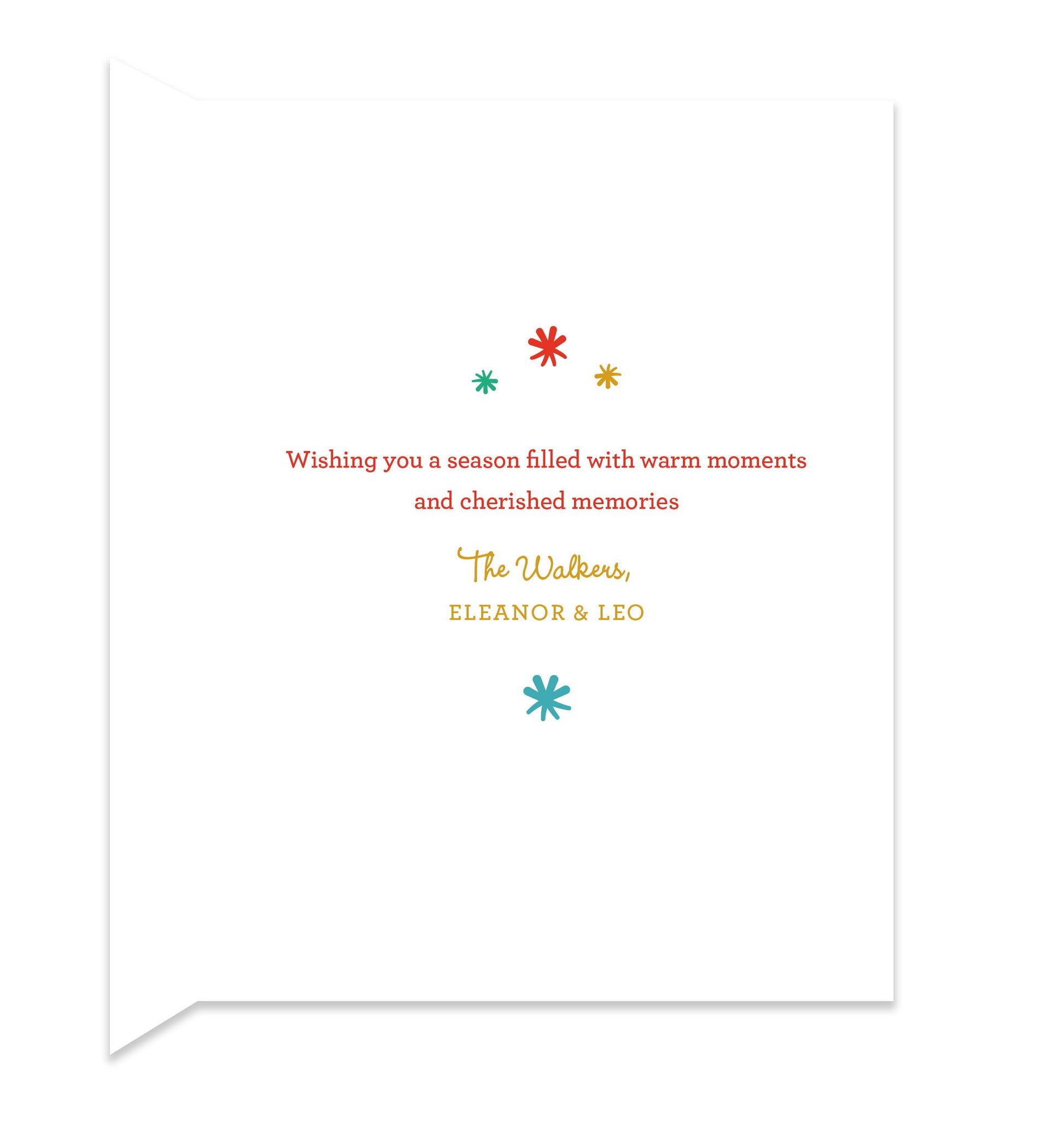 Inside of folded holiday card with coordinating color stars and a personal greeting.