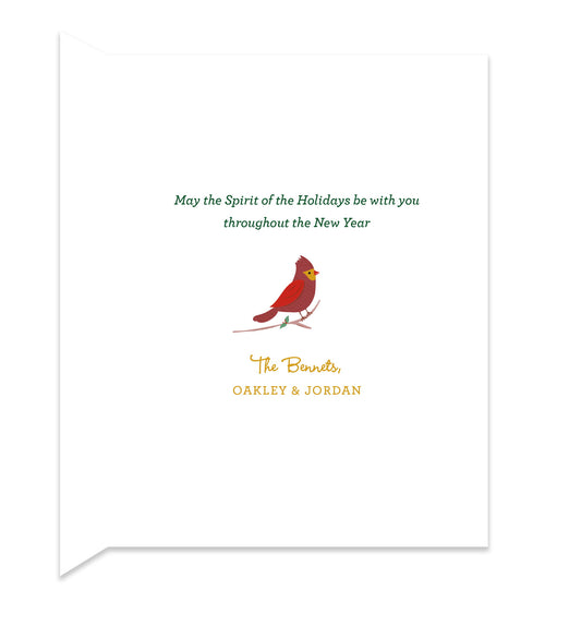 Inside of folded holiday card with coordinating red bird design and personal greeting.