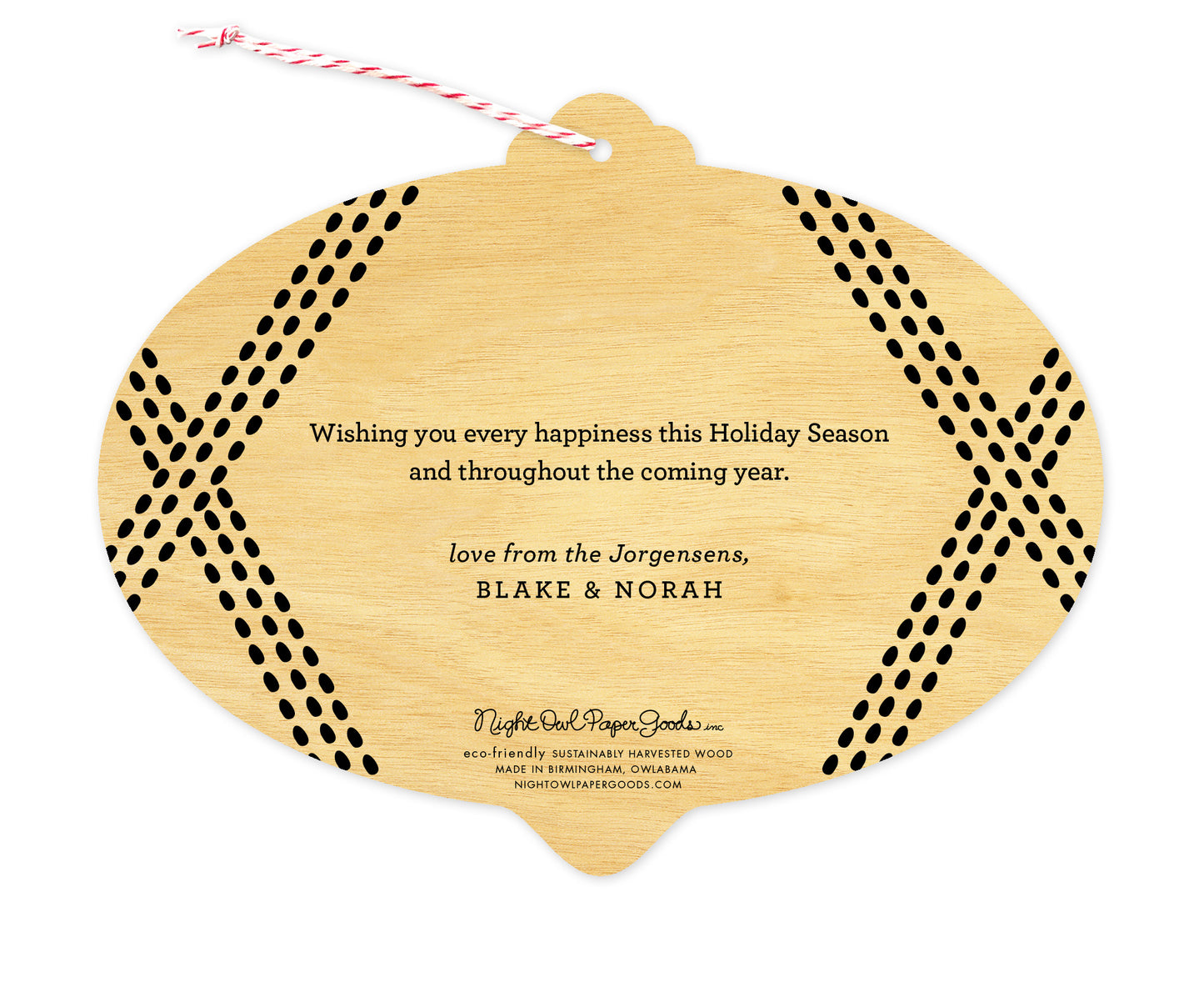 Back of customizable bulb-shaped wood holiday card ornament with Text Back option, showing a personal greeting bordered by black speckled lines.