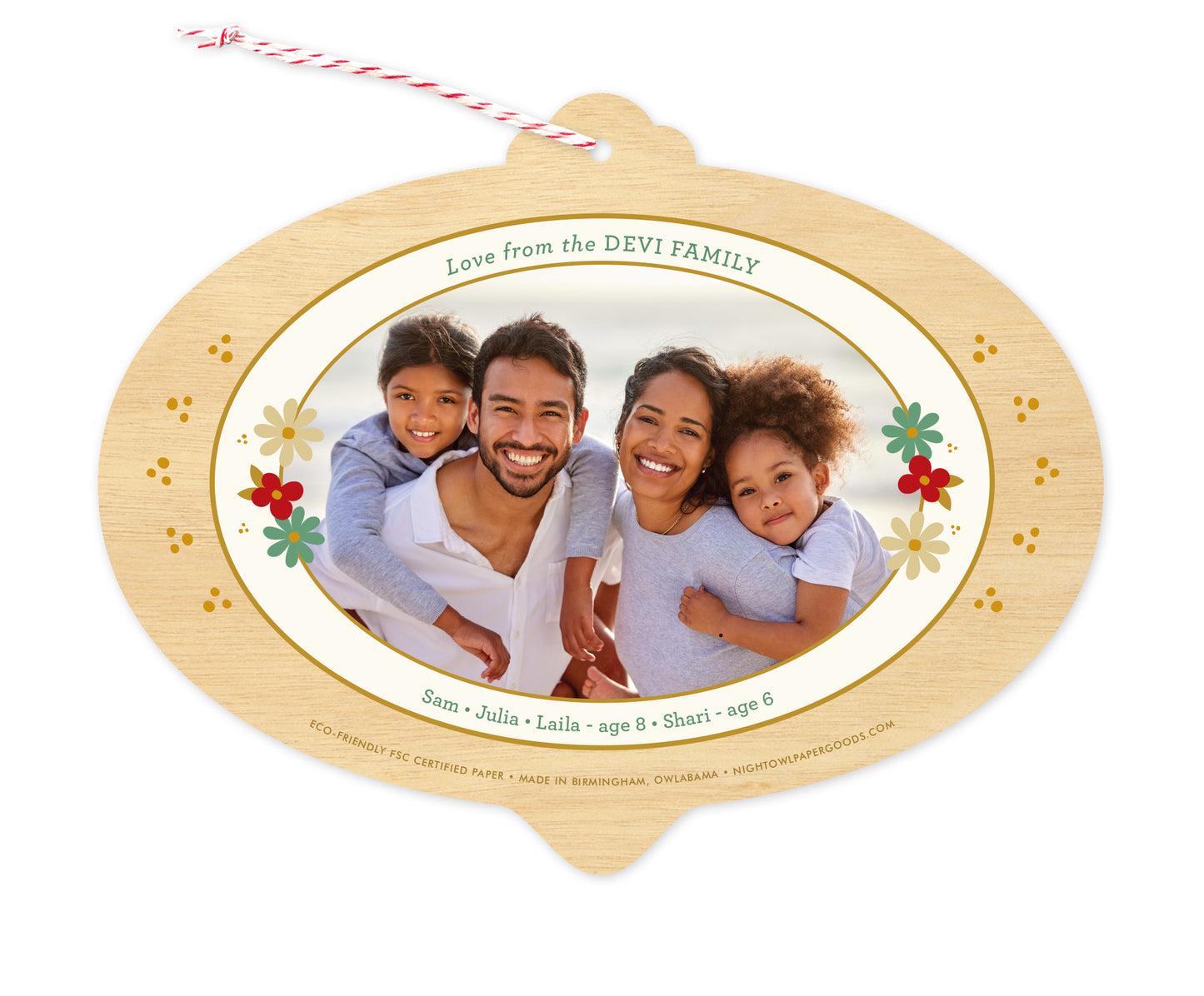 Back of customizable bulb-shaped paper holiday ornament card with Photo + Text Back option showing a personal photo and message accented by several small flowers and a printed birch wood grain border.