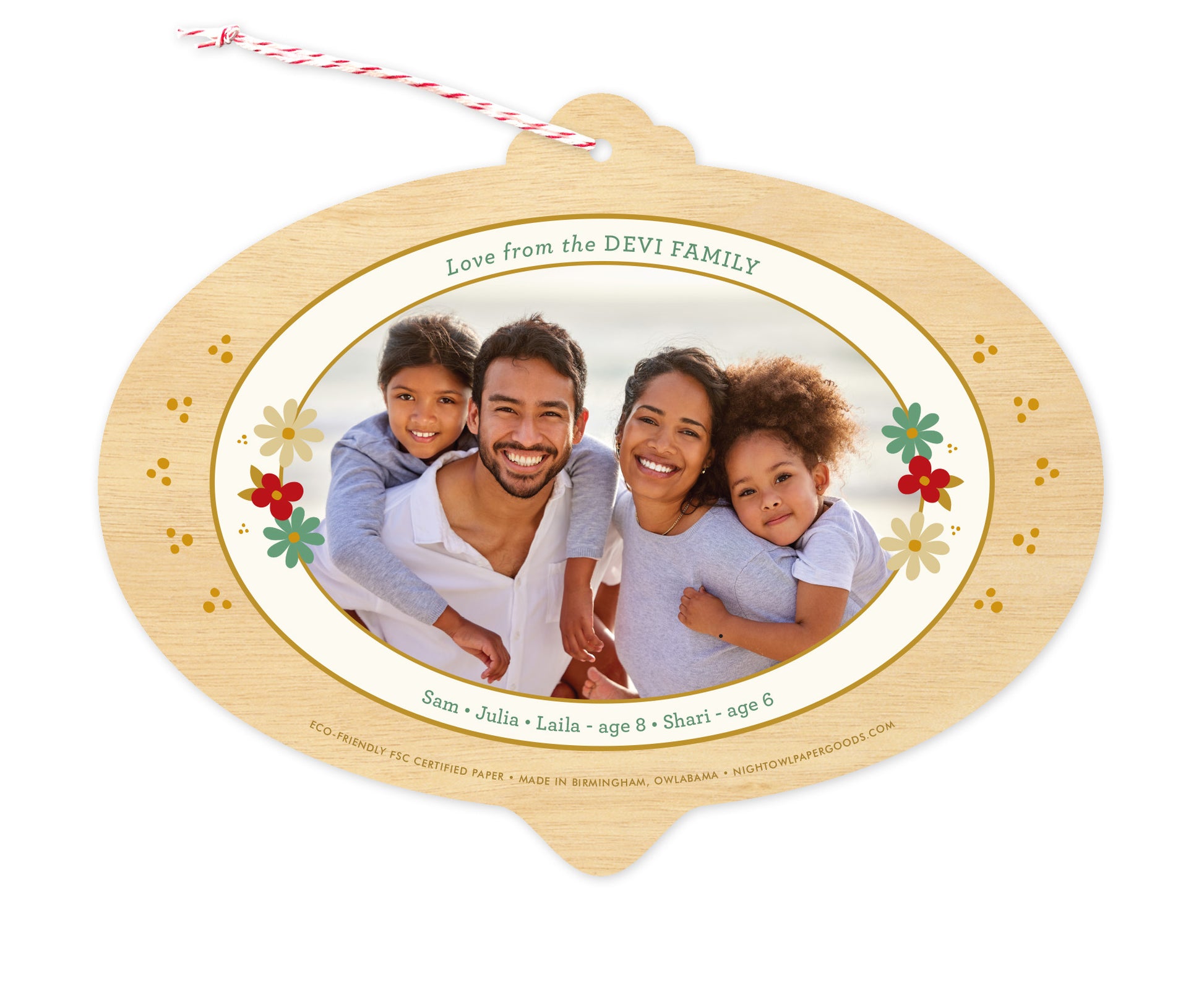 Back of customizable bulb-shaped paper holiday ornament card with Photo + Text Back option showing a personal photo and message accented by several small flowers and a printed birch wood grain border.