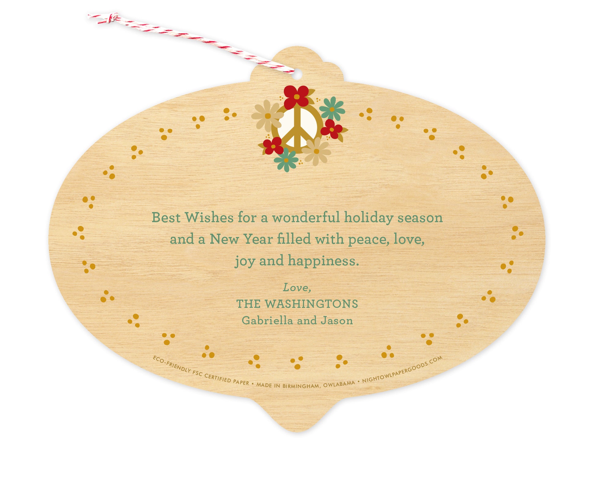 Back of customizable bulb-shaped paper holiday card ornament with Text Back option, showing a peace sign adorned with flowers and a personal greeting on a printed birch wood grain background.