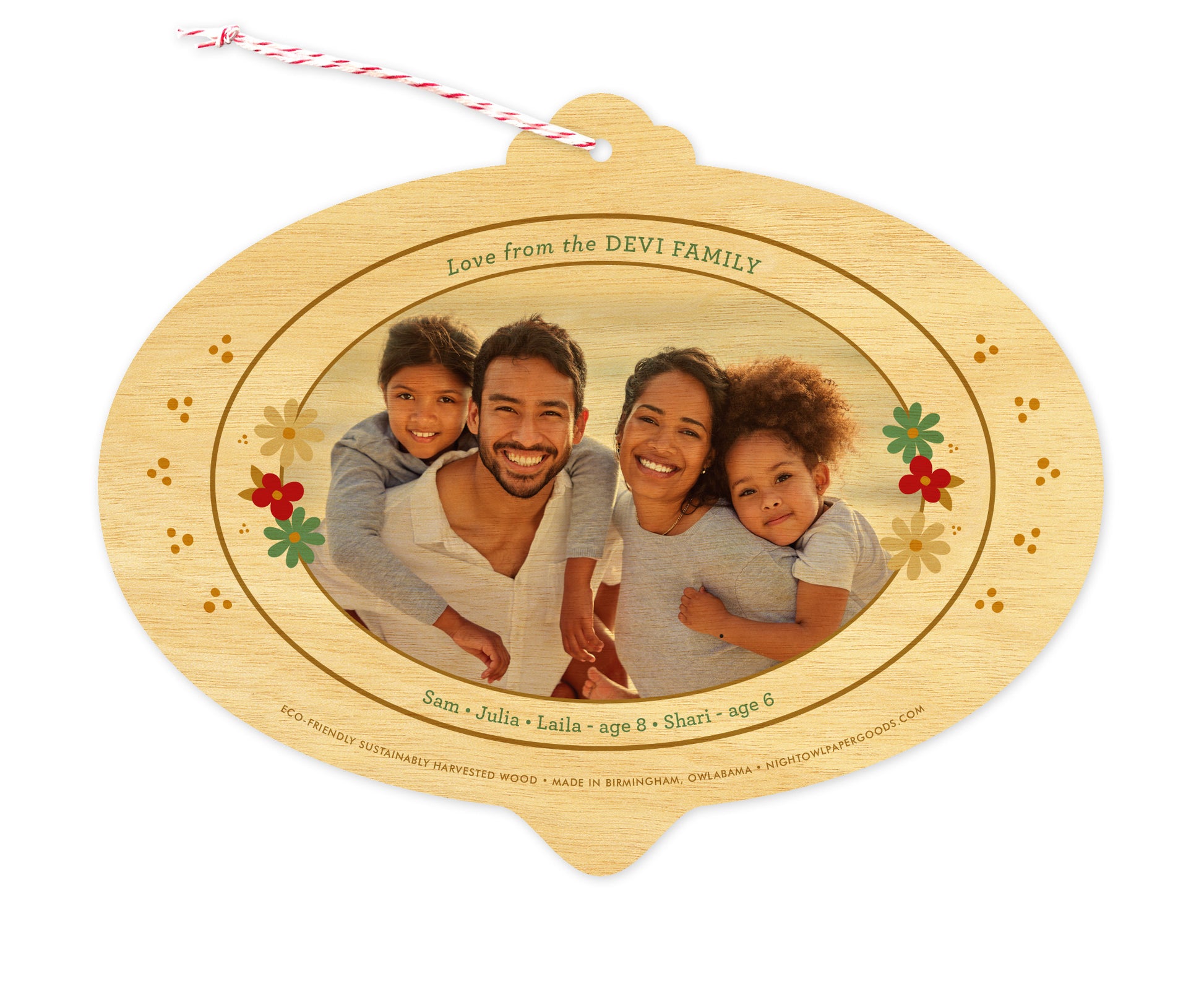 Back of customizable bulb-shaped wood holiday ornament card with Photo + Text Back option showing a personal photo and message accented by several small flowers.
