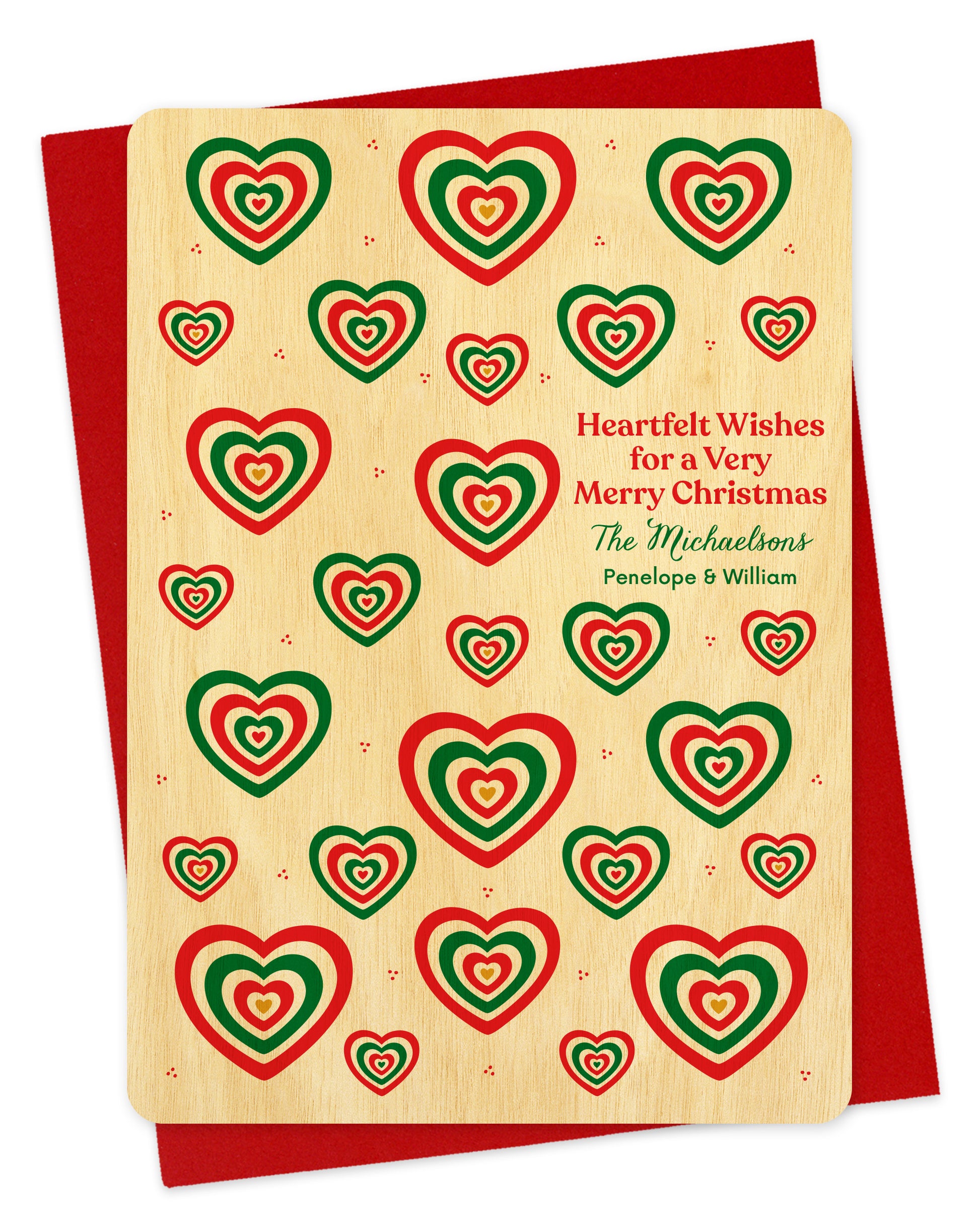 Customizable birch wood Christmas card with red and green heart patterns. Add your own personal greeting.