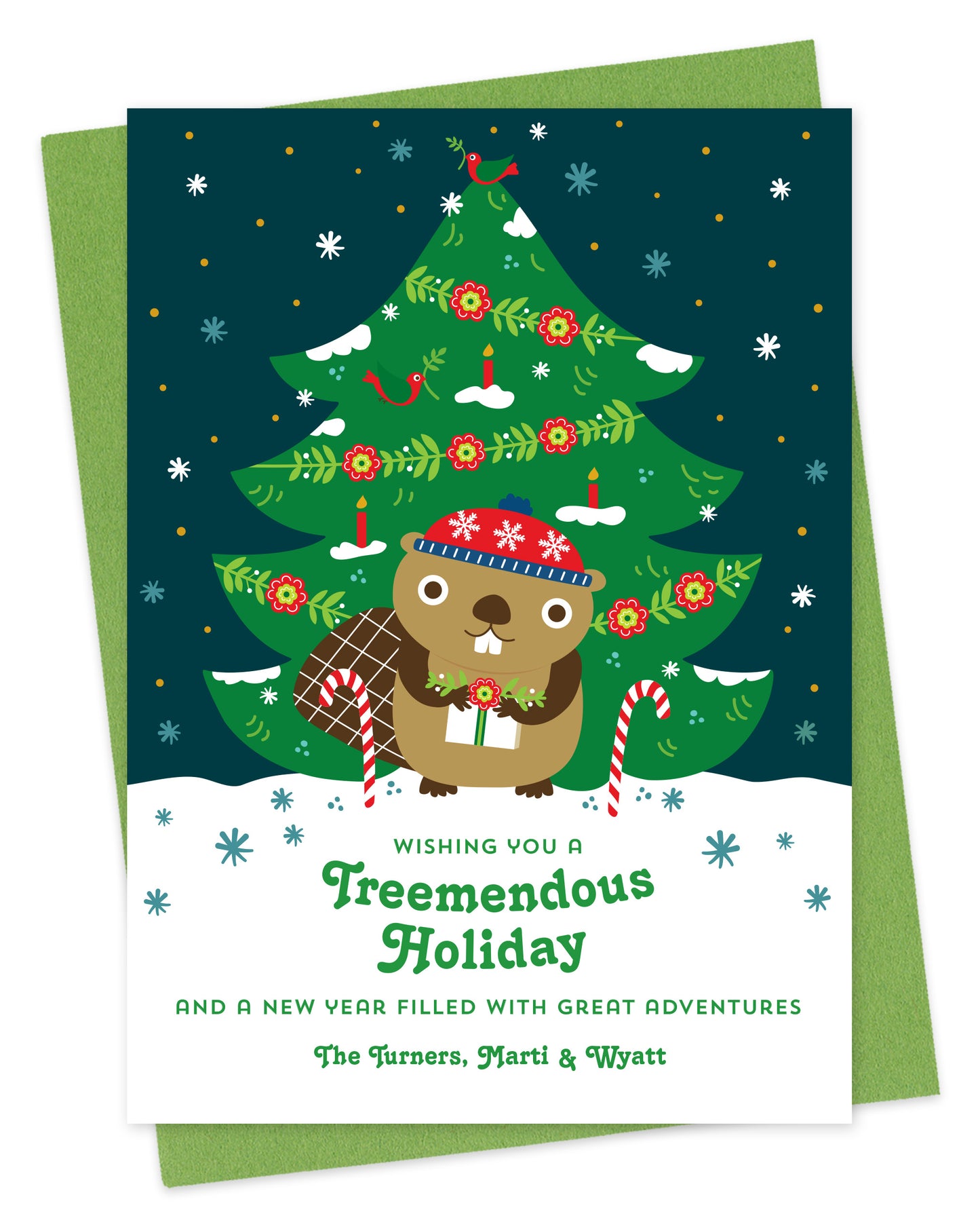 Customizable paper holiday card featuring a cute beaver holding a gift in front of a decorated outdoor Christmas tree, "Wishing you a Treemendous Holiday" text and a personal greeting at the bottom. Shown with a green envelope.