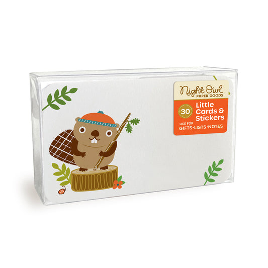 A clear plastic box displaying a small white note card with rounded corners featuring a cute beaver wearing an orange beanie on a tree stump. The box label reads “Night Owl Paper Goods - 30 - Little Cards & Stickers - Use for Gifts, Lists, Notes.”