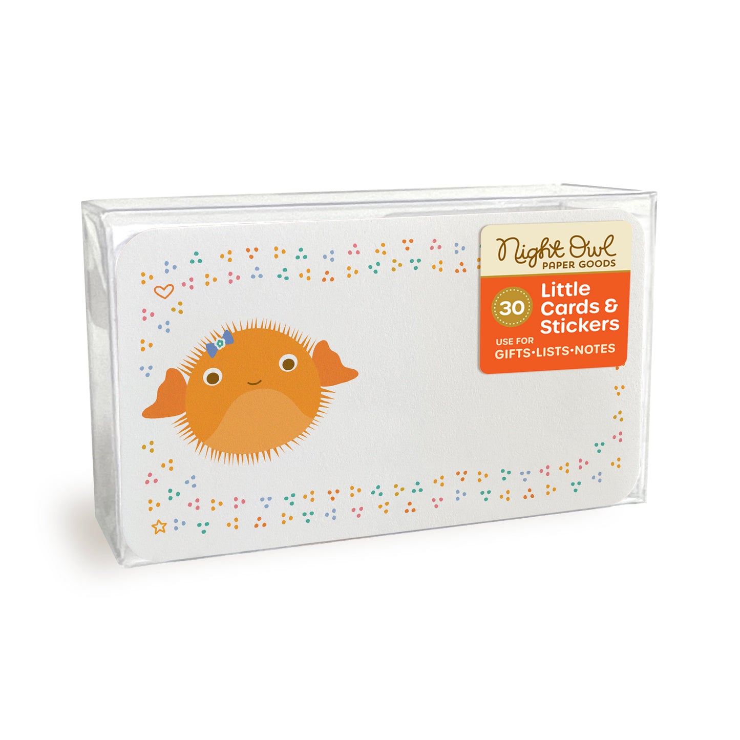 A clear plastic box displaying a small white note card with rounded corners featuring a cute orange puffer fish surrounded by colorful confetti-like dots, a heart and a star. The box label reads “Night Owl Paper Goods - 30 - Little Cards & Stickers - Use for Gifts, Lists, Notes.”