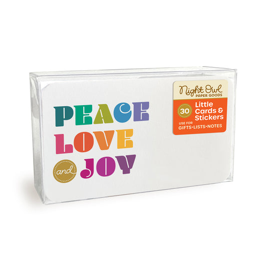 A clear plastic box displaying a small white note card with rounded corners featuring colorful “PEACE LOVE and JOY” lettering. The box label reads “Night Owl Paper Goods - 30 - Little Cards & Stickers - Use for Gifts, Lists, Notes.”