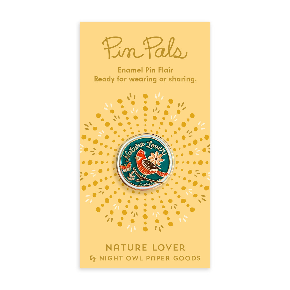 Nature Lover enamel pin on a yellow backer card. Pin features a blue background with a red and brown bird, a peach flower, a butterfly and the words 'Nature Lover' in gold script. Backer card reads "Pin Pals Enamel Pin Flair Ready for wearing or sharing. NATURE LOVER by Night Owl Paper Goods.