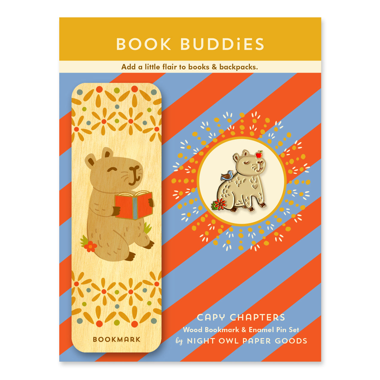 Capy Chapters Book Buddies wood bookmark and enamel pin gift set featuring a capybara holding a book on a wooden bookmark and a coordinating capybara enamel pin on a colorful striped backer card.