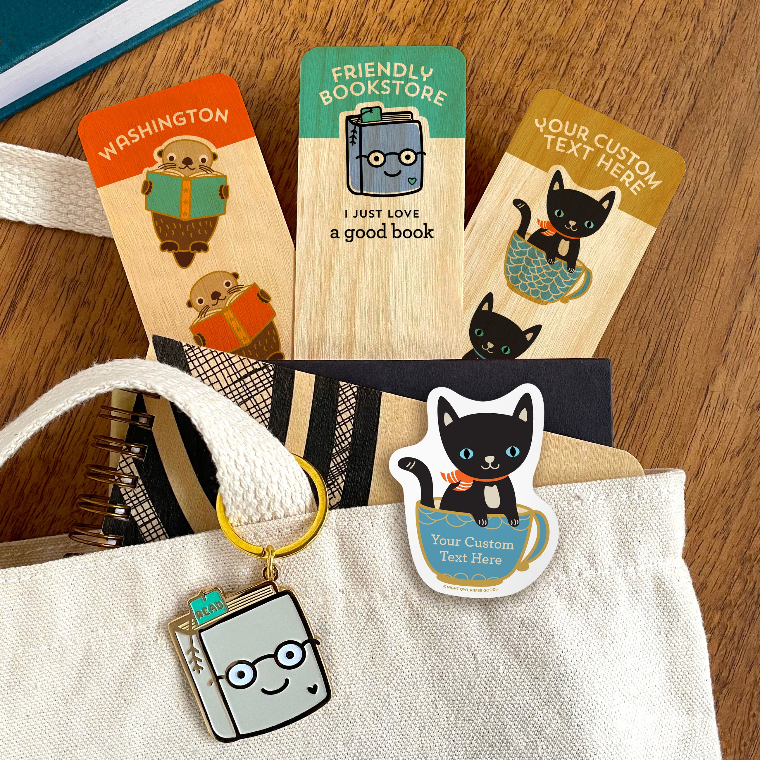 Customizable bookmarks and stickers alongside a Book Lover keychain