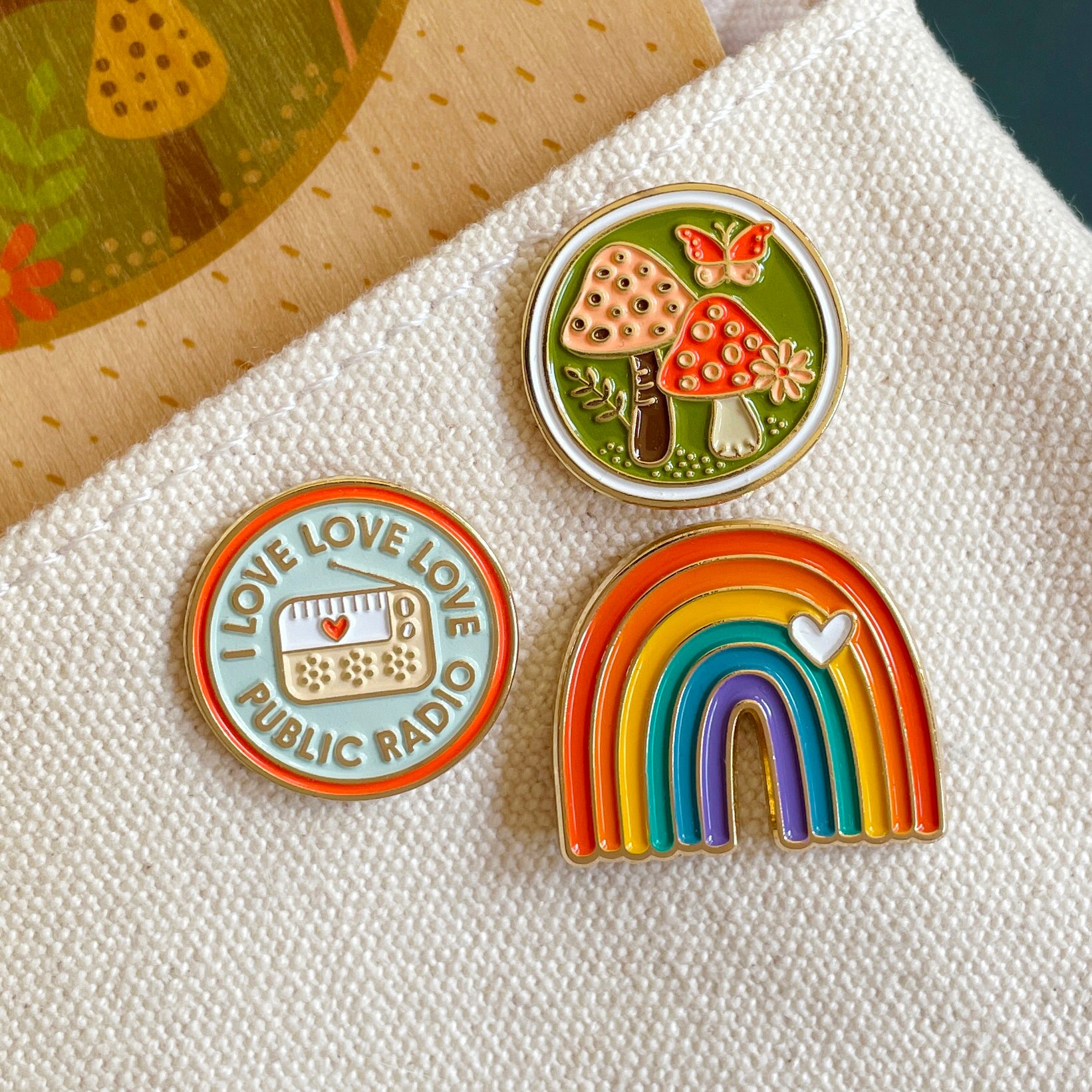 Mushrooms, Rainbow and I Love Public Radio enamel lapel pins