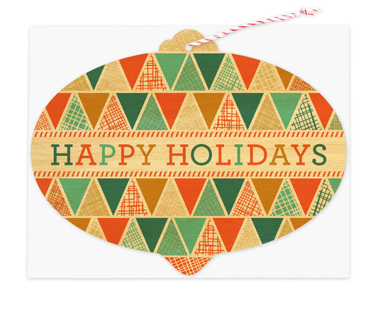 Wood holiday ornament card with geometric pattern and "Happy Holidays" text. Shown on a white envelope.