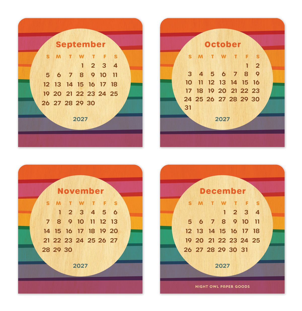 Birch wood mini desk calendar featuring bold horizontal rainbow stripes surrounding a natural birch wood circle with the month and dates. September, October, November and December 2027 calendar pages are shown.