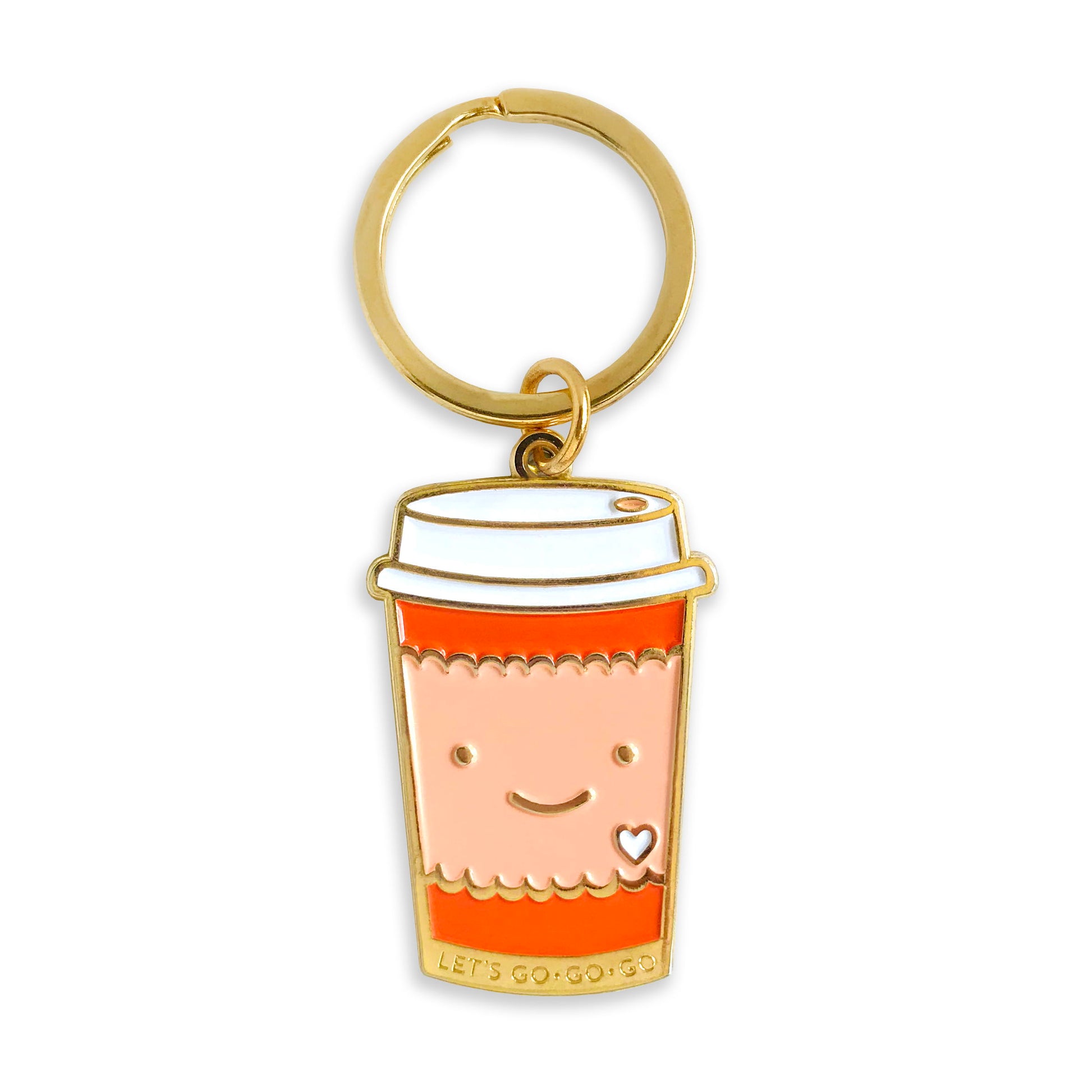 Gold metal coffee to go cup enamel keychain with red cup, white lid and pink sleeve with a smiling face and heart detail. Front bottom of cup reads "Let's Go Go Go" and keychain hangs from a gold key ring.  