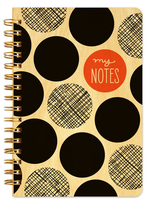 Spiral-bound wood notebook with birch wood covers featuring bold black polka dots with a crosshatch texture and an red circle with "my Notes" text.