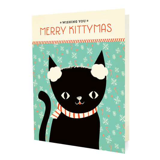 Front of folded holiday card featuring a black cat wearing earmuffs on an aqua background with snowflakes, candy canes, and “Wishing You Merry Kittymas” text.